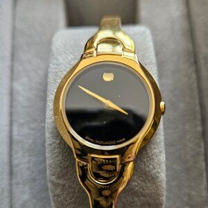 Movado Gold Bangle Watch with Classic Black Face